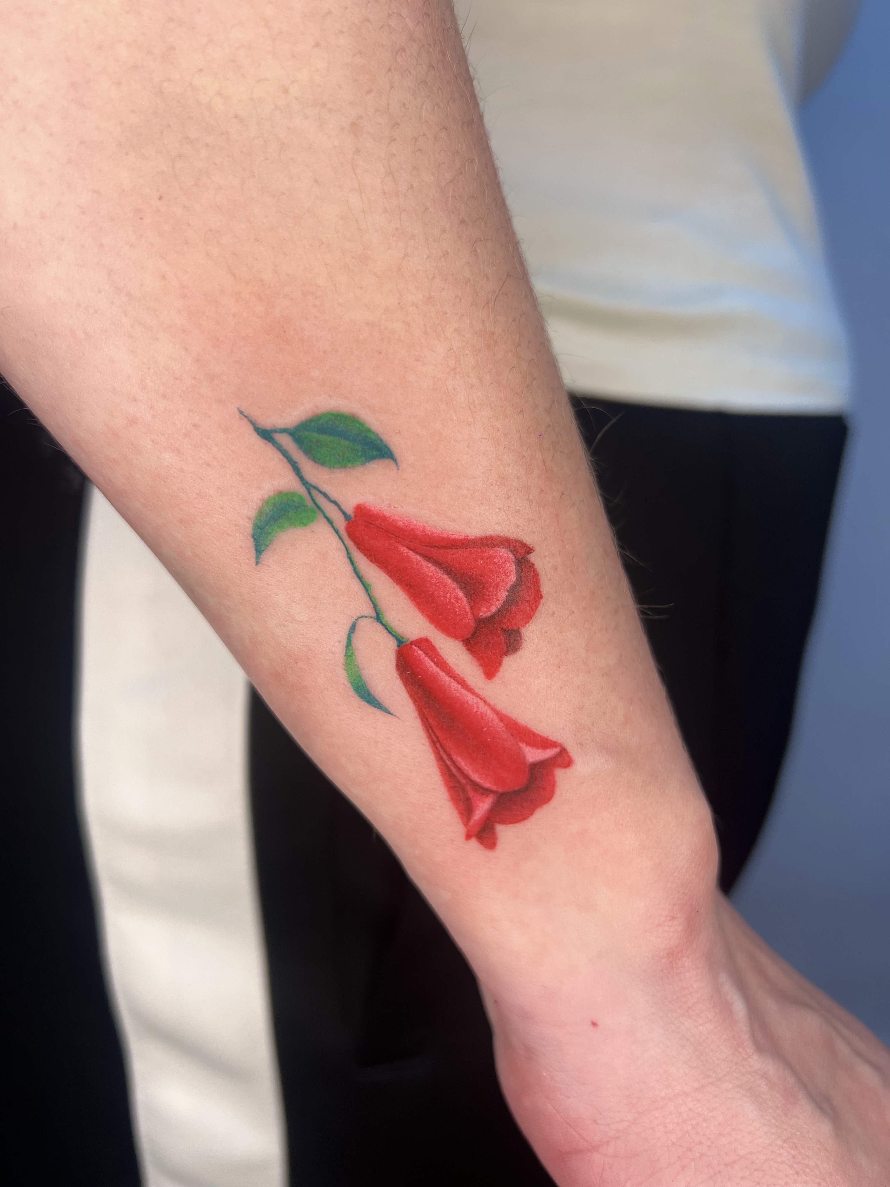 Copihue tattoo wrist. Caos Art Tattoo Santiago