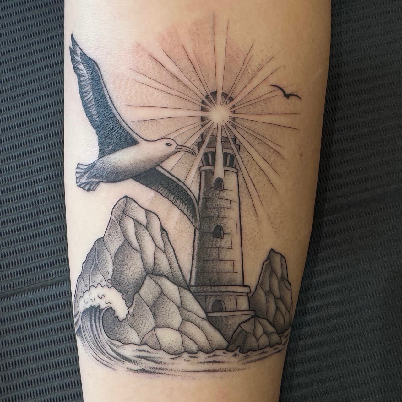 El Faro Austral — tatuaje faro albatros Caos Art Tattoo Santiago