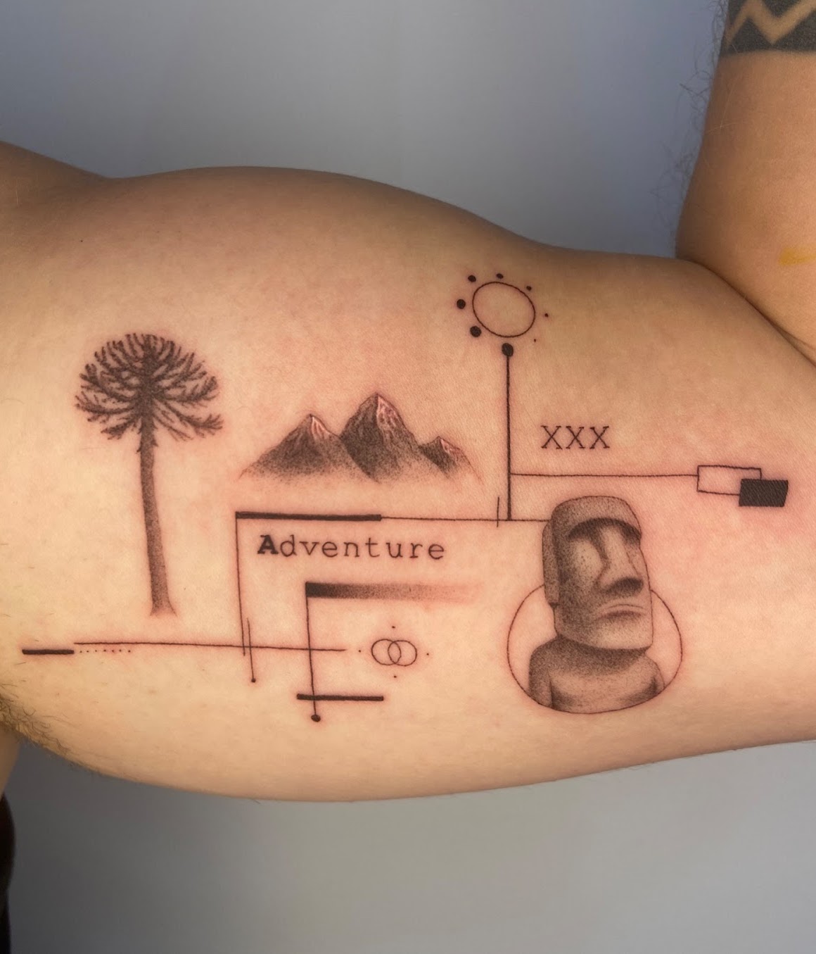 Rapa Nui Moai fine line tattoo Santiago Chile