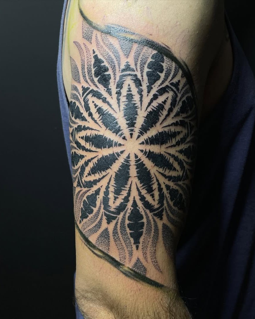 Geometric blackwork mandala sleeve tattoo Santiago Chile